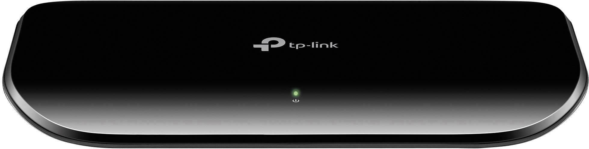 Un switch di rete TP-Link nero con indicatore LED verde sul lato anteriore, idoneo per collegare più dispositivi.