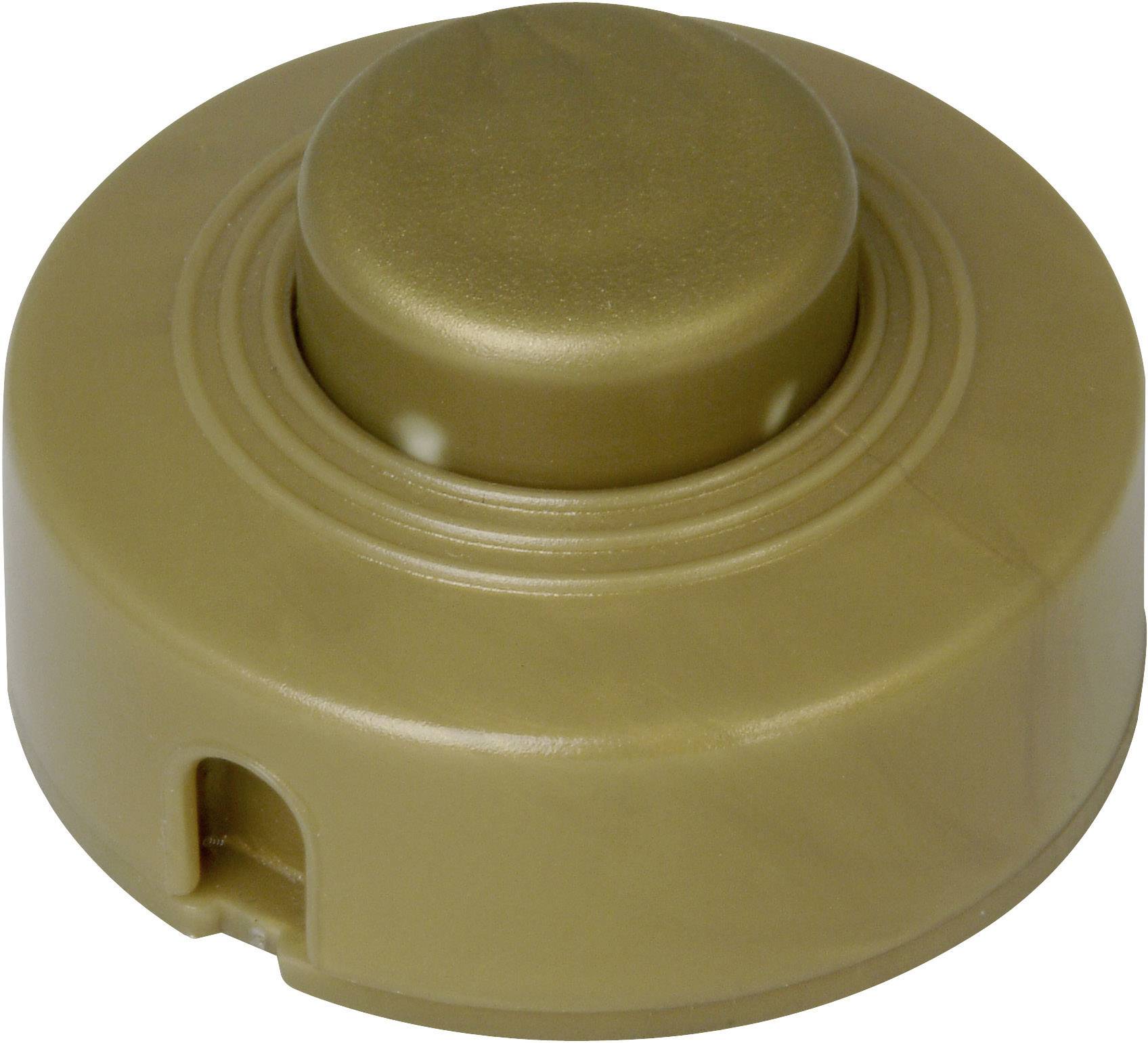 Scatola rotonda marrone con un grande pulsante centrale.