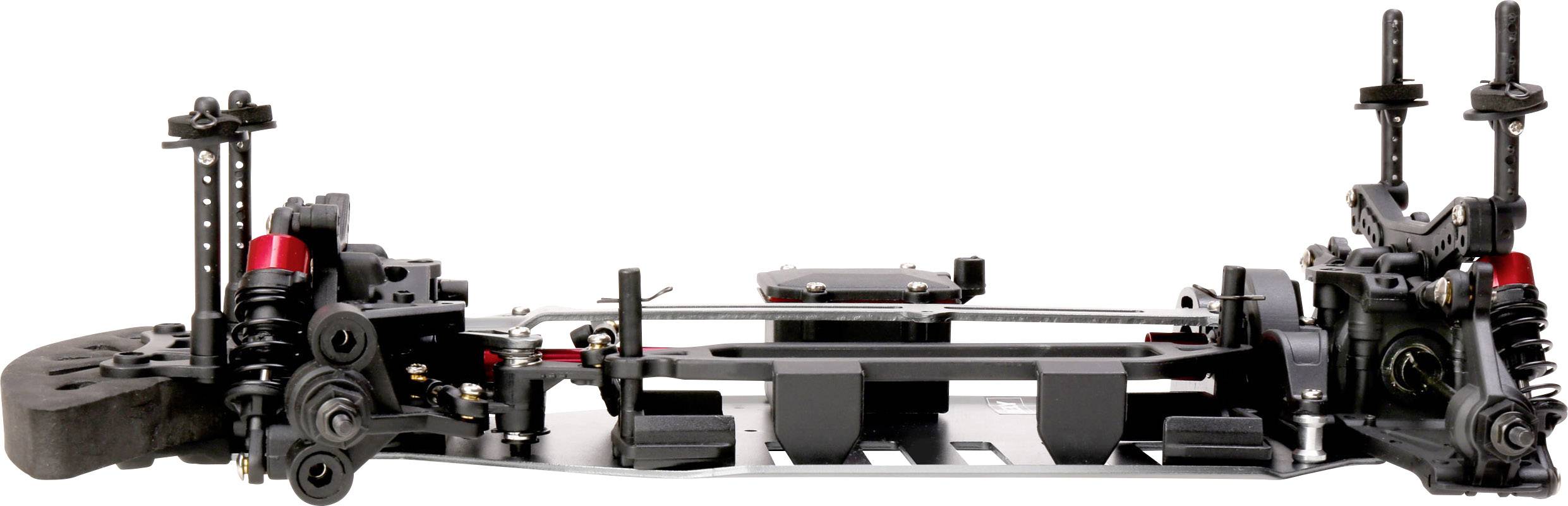 Telaio di un modellino di auto con ammortizzatori, trasmissione e assi visibili. Vista dettagliata della meccanica del veicolo.
