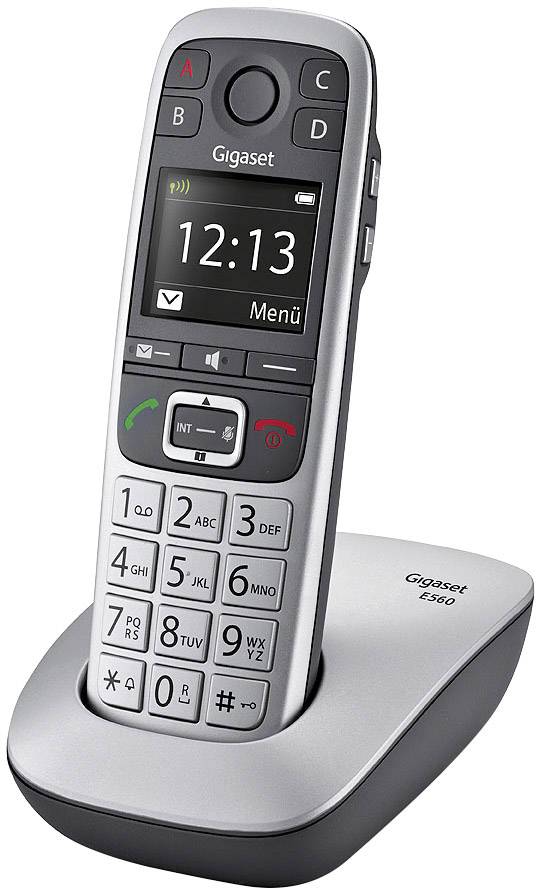 Telefono cordless su stazione di ricarica con display grande e tasti grandi, che mostra l'ora 12:13 e simboli di chiamata e messaggio.