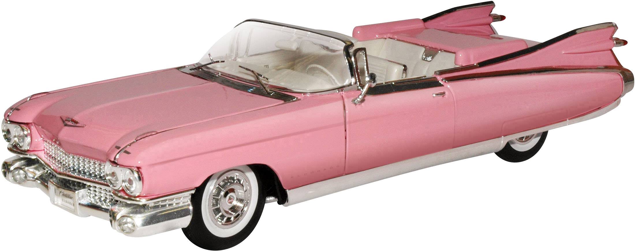 Vecchia auto cabriolet rosa con pinne posteriori caratteristiche, probabilmente degli anni '50 o '60, su sfondo bianco.