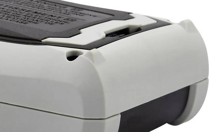 Un pacco batteria grigio e nero con superficie lucente e un'etichetta informativa sulla parte superiore.