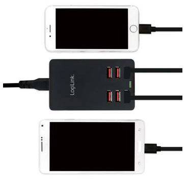 Smartphone caricati tramite hub USB con multiple porte.