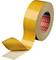 Un rotolo di nastro adesivo giallo con una striscia parzialmente srotolata.