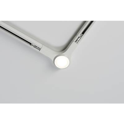 Un lampadario moderno con un'illuminazione LED circolare inserita in una cornice metallica a forma di Y, montato su un soffitto bianco.
