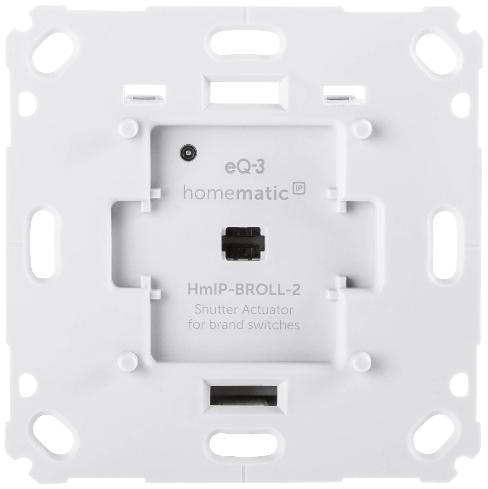 Un attuatore per tapparelle da incasso bianco di Homematic IP, modello HmIP-BROLL-2, idoneo per interruttori di marca, con fessure di montaggio.