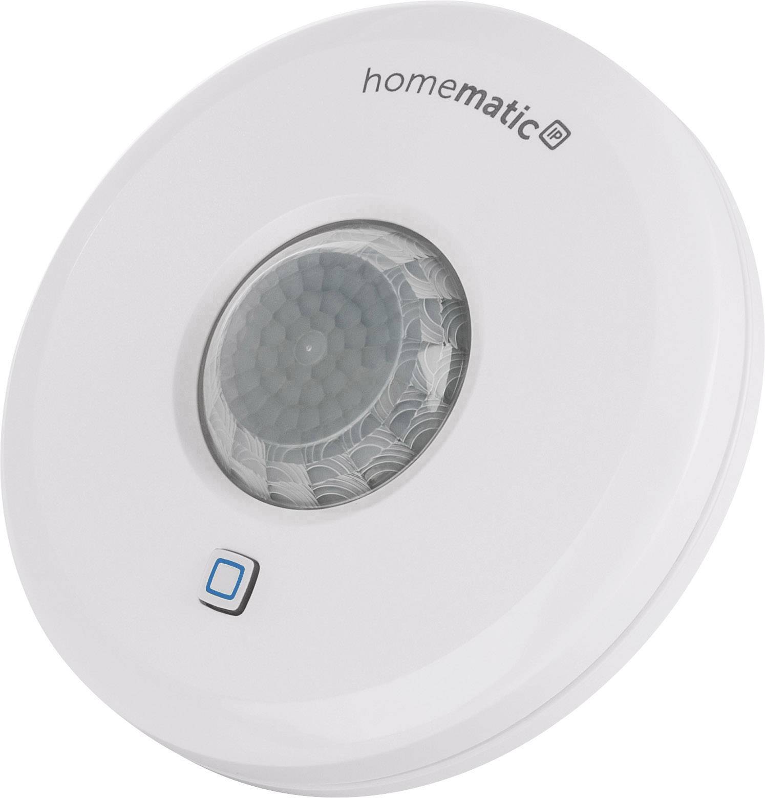Un sensore di movimento rotondo, bianco, con il logo 'homematic', una lente al centro e un pulsante quadrato blu sotto di esso.