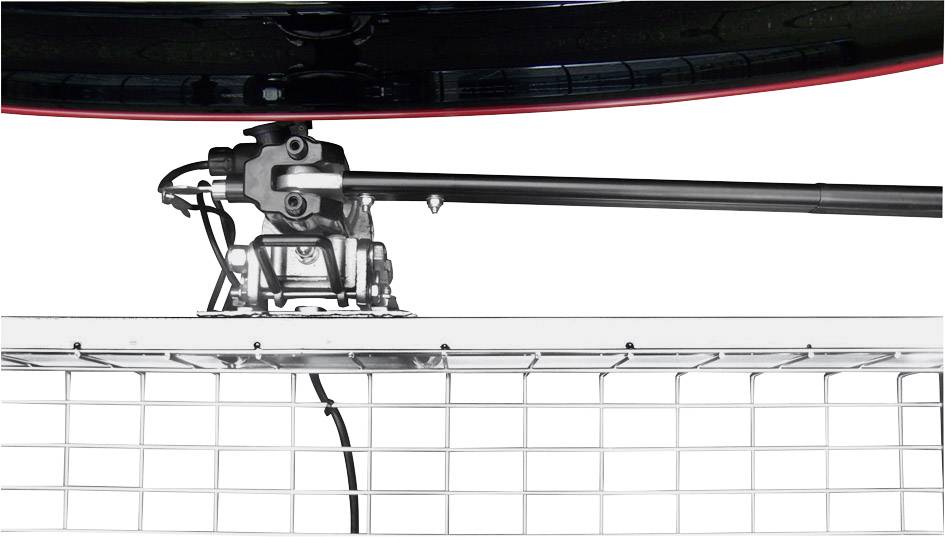 Porta da calcio con rete e dispositivo meccanico in alto, probabilmente parte di una macchina per il recupero o l'allenamento della palla.