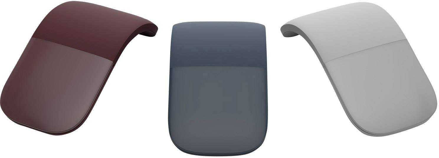 Tre mouse wireless curvi nei colori rosso borgogna, grigio scuro e grigio chiaro su uno sfondo tinta unita.