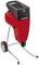 Biotrituratore con custodia rossa, due ruote e bocca di carico superiore. Marca 'Einhell'. Per triturare in modo silenzioso i rifiuti da giardino.
