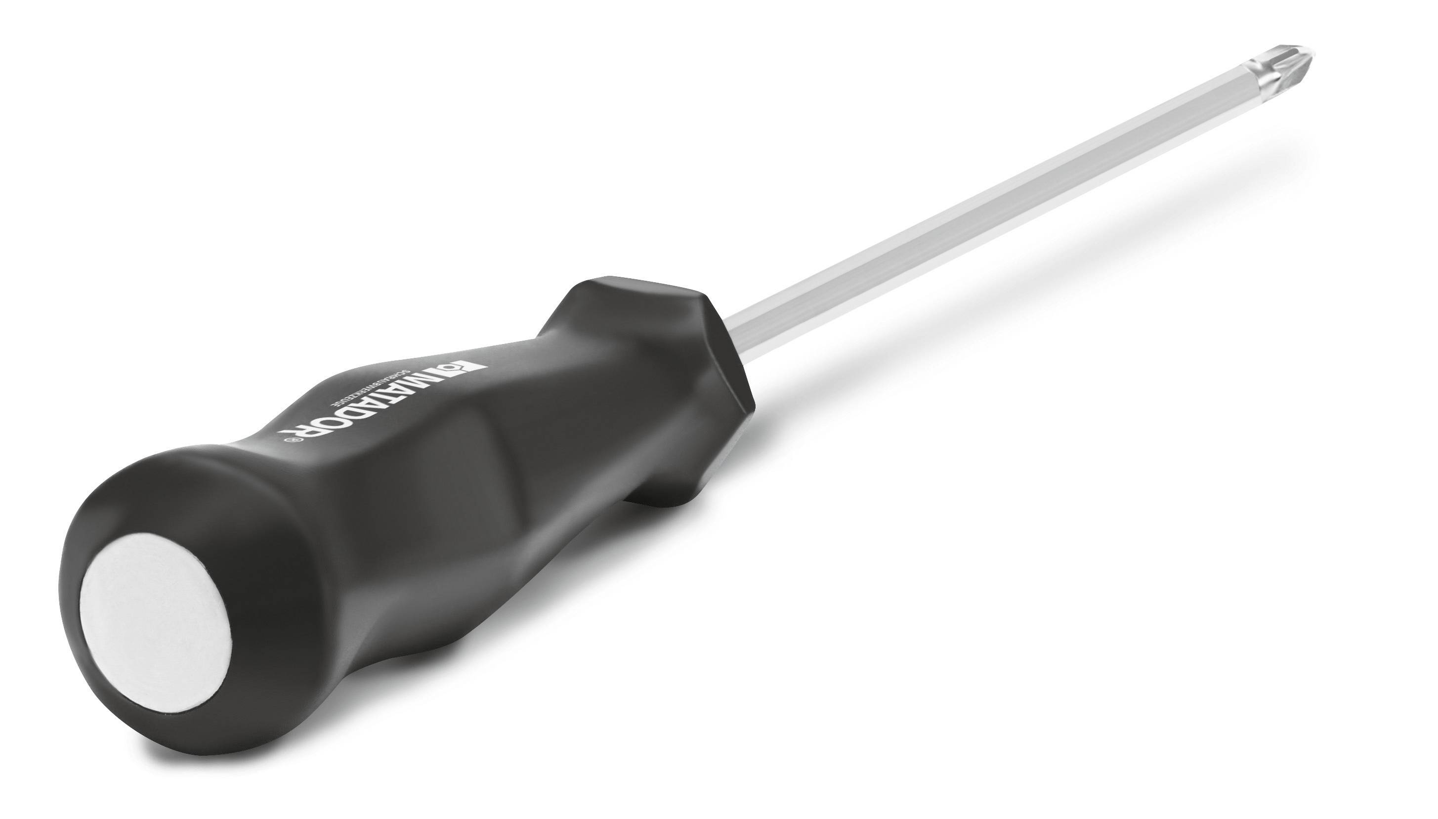 Cacciavite nero con impugnatura ergonomica e punta in metallo argentata, adagiato su una superficie bianca.