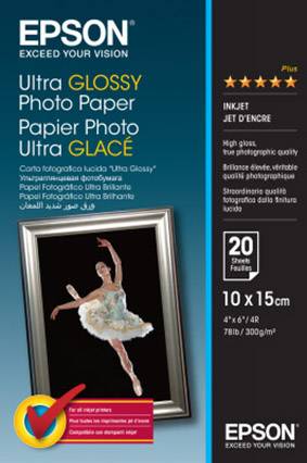 Confezione di carta fotografica Epson Ultra Glossy. Contiene 20 fogli, formato 10 x 15 cm, adatta per stampanti a getto d'inchiostro. Immagine di una ballerina in cornice.