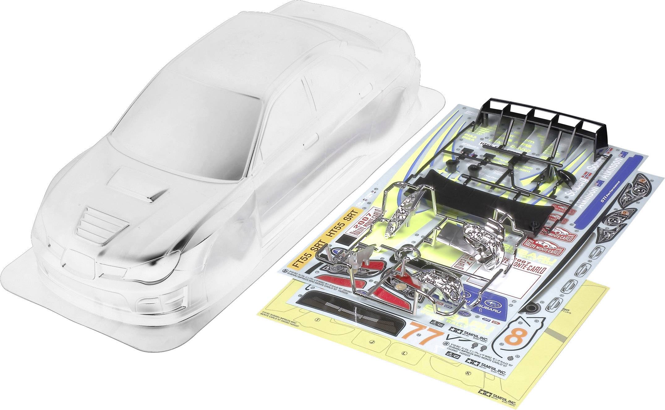 Un kit di carrozzeria per modellino auto trasparente, completo di adesivi e piccoli componenti, pronto per l'assemblaggio e la personalizzazione.