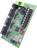 Scheda elettronica con morsetti di connessione neri, microchip e blocco di connessione verde, utilizzata per il controllo di dispositivi.