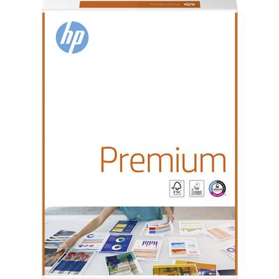'Mani sistemano grafiche stampate colorate su un tavolo bianco. La confezione mostra il logo HP e la scritta "Premium".'