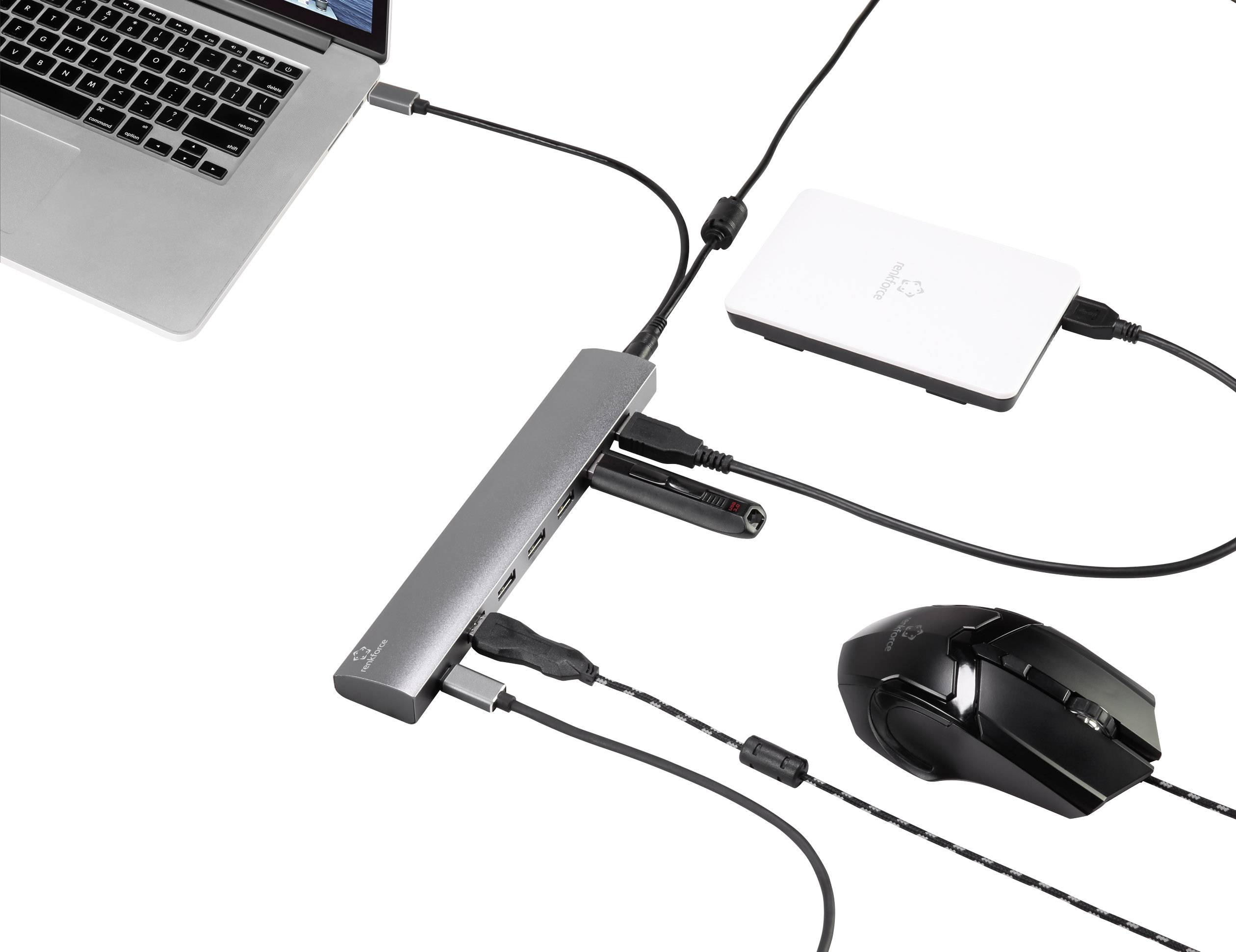 Computer portatile collegato a un hub USB, al quale sono connessi un hard disk, un mouse e una chiavetta USB. Mostra le diverse possibilità di connessione.