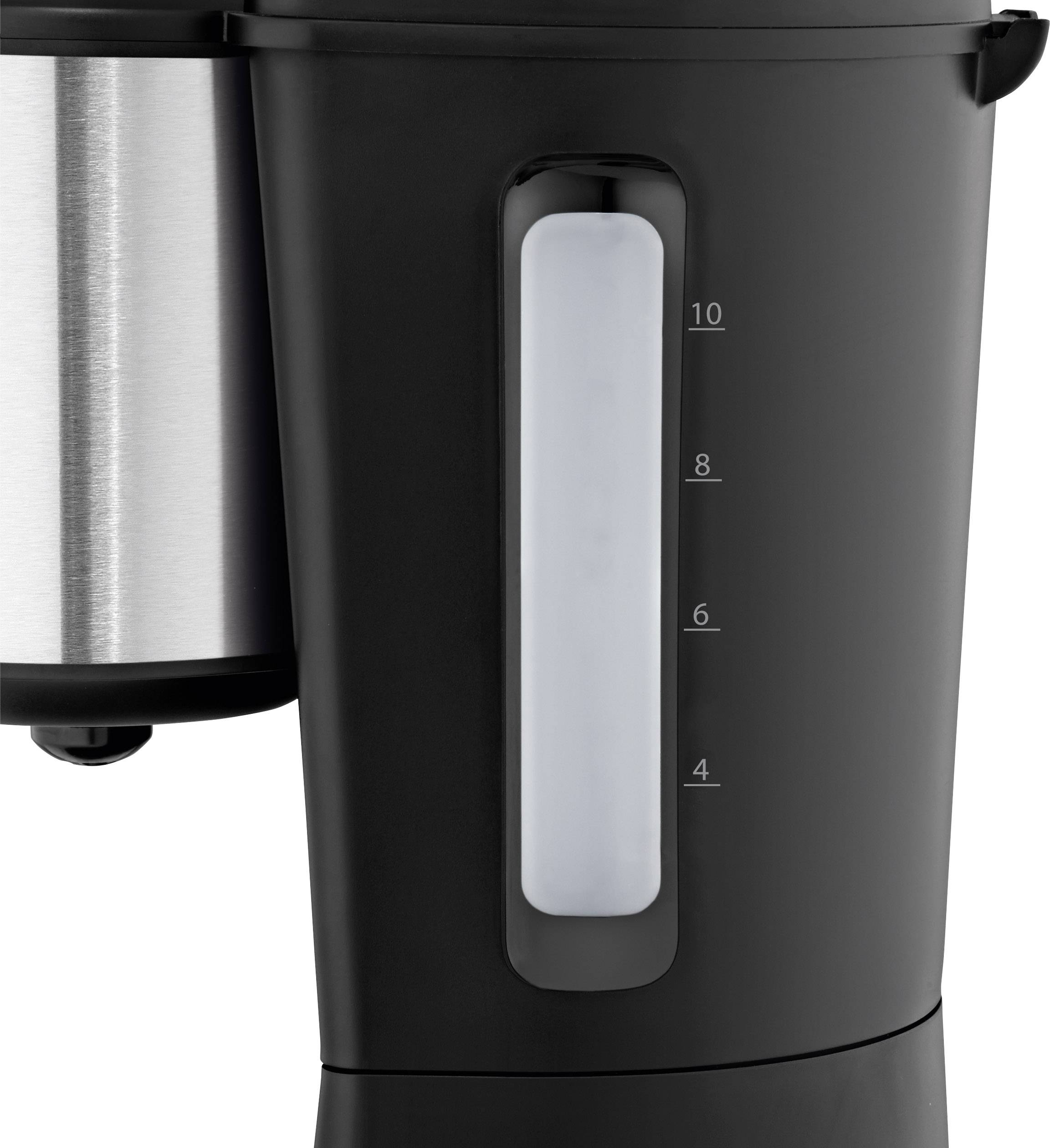 Una macchina da caffè nera con un indicatore del livello dell'acqua contrassegnato da 4 a 10. A sinistra è parzialmente visibile il contenitore termico argentato.