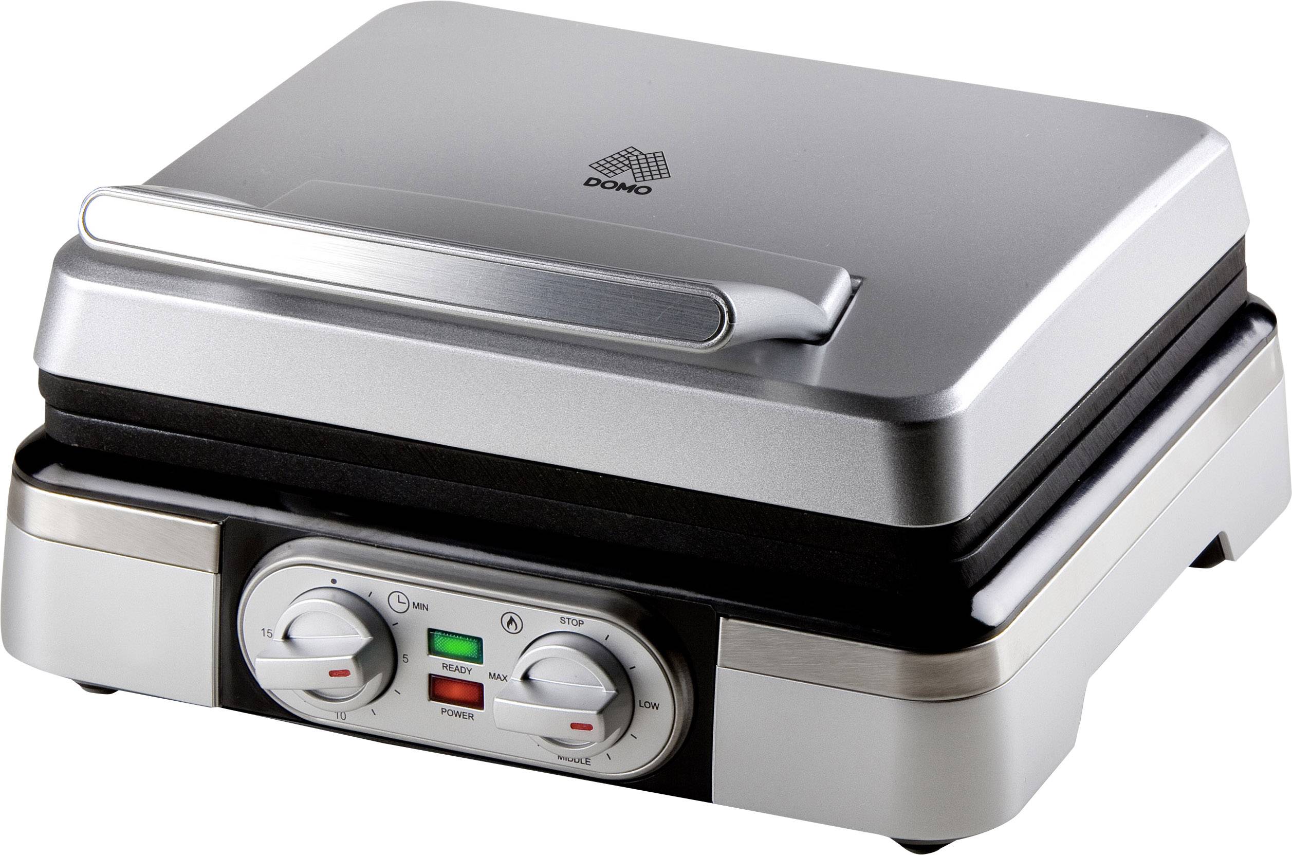 Un grill a contatto in argento con due manopole di regolazione e spie luminose sul davanti. Ideale per grigliare panini e carne.