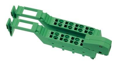 Un componente elettronico verde, rettangolare, con diversi fori circolari per l'inserimento e supporti laterali.
