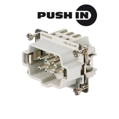 Connettore con tecnologia PUSH IN, bianco, contrassegnato con "HDC HE 6 MP", che mostra i pin metallici e gli elementi di fissaggio.
