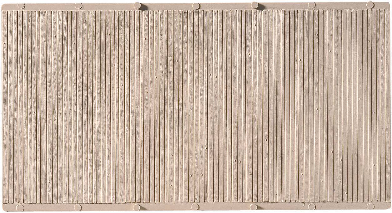 Un pannello rettangolare color crema con motivo a linee verticali, utilizzato come rivestimento murale o pavimentazione per interni.