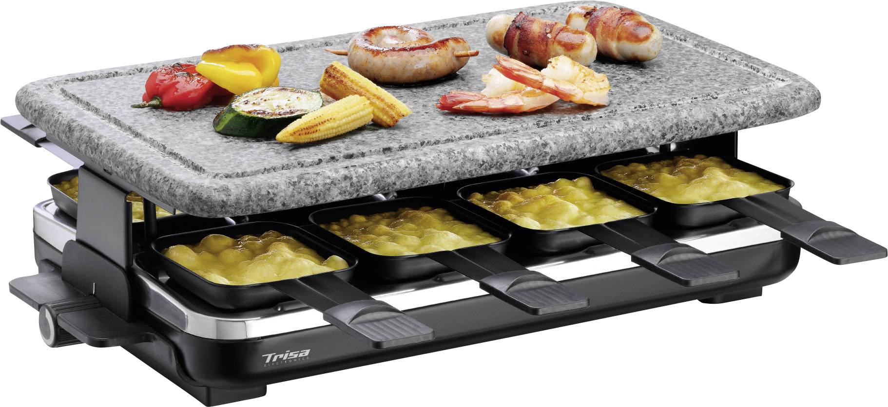 Un grill per raclette con piccole padelle calde riempite di formaggio fuso sotto, e sulla pietra piana sopra ci sono verdure e carne alla griglia.