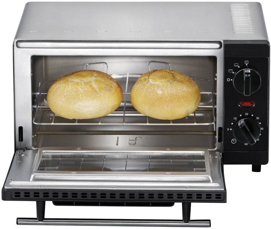 Un piccolo forno elettrico con la porta aperta, nel quale due panini vengono cotti su una griglia. Manopole per la regolazione della temperatura a destra.