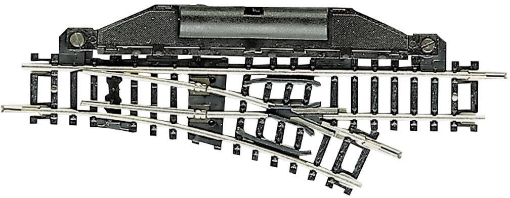 Un pezzo di deviazione per plastico ferroviario. Mostra un diramazione da un binario principale a un binario secondario. Utensile per la costruzione di modellini ferroviari.