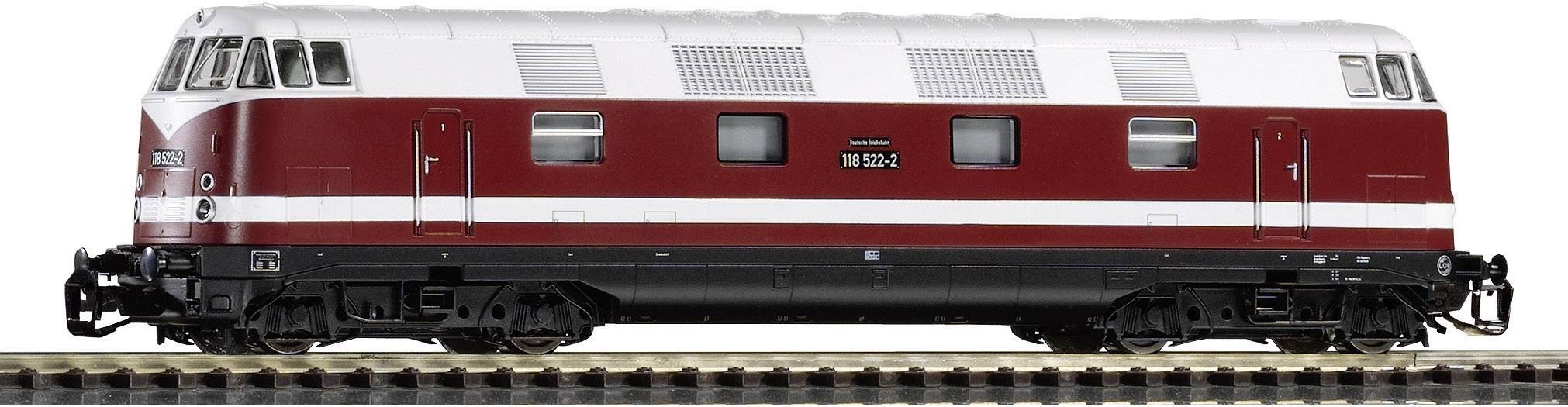 Un treno diesel bicolore con design rosso e bianco, in viaggio sui binari.