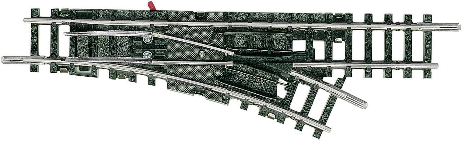 Un 'deviatoio di un binario per modellismo ferroviario' mostra un incrocio in cui i binari si diramano in due direzioni; un binario principale e un binario secondario.