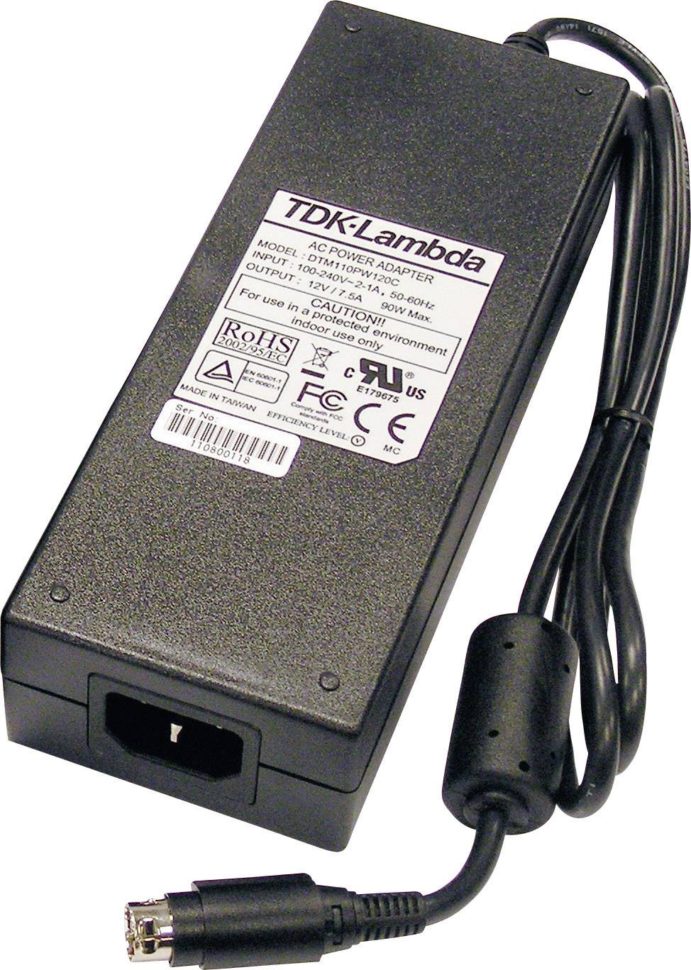 Alimentatore nero, marca TDK-Lambda, con cavo e spina. L'etichetta mostra specifiche tecniche e loghi di certificazione.