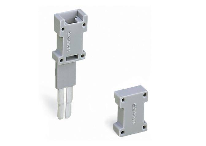 Due spine elettriche grigie, una delle quali con cavi.