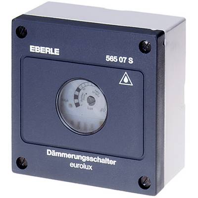 Un interruttore crepuscolare rettangolare con l'etichetta 'EBERLE' e 'eurolux'. Ha un quadrante rotondo per regolare la sensibilità alla luce.