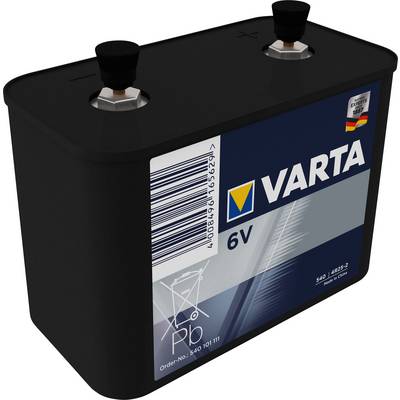 Batteria nera VARTA con scritta 6V, codice a barre ed emblema tedesco. Due poli argentati sulla parte superiore.