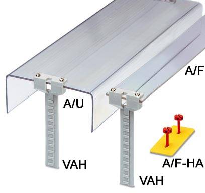 Sistema in alluminio per il fissaggio di pannelli. Mostra due profili di montaggio etichettati come 'A/U VAH' e 'A/F VAH', con viti su un supporto giallo.