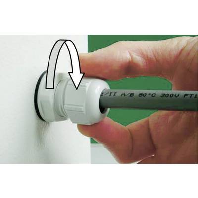 Una mano tira il cavo attraverso un dado bianco nel muro. Una freccia indica la direzione di rotazione per serrare. Un morsetto in plastica assicura il cavo.