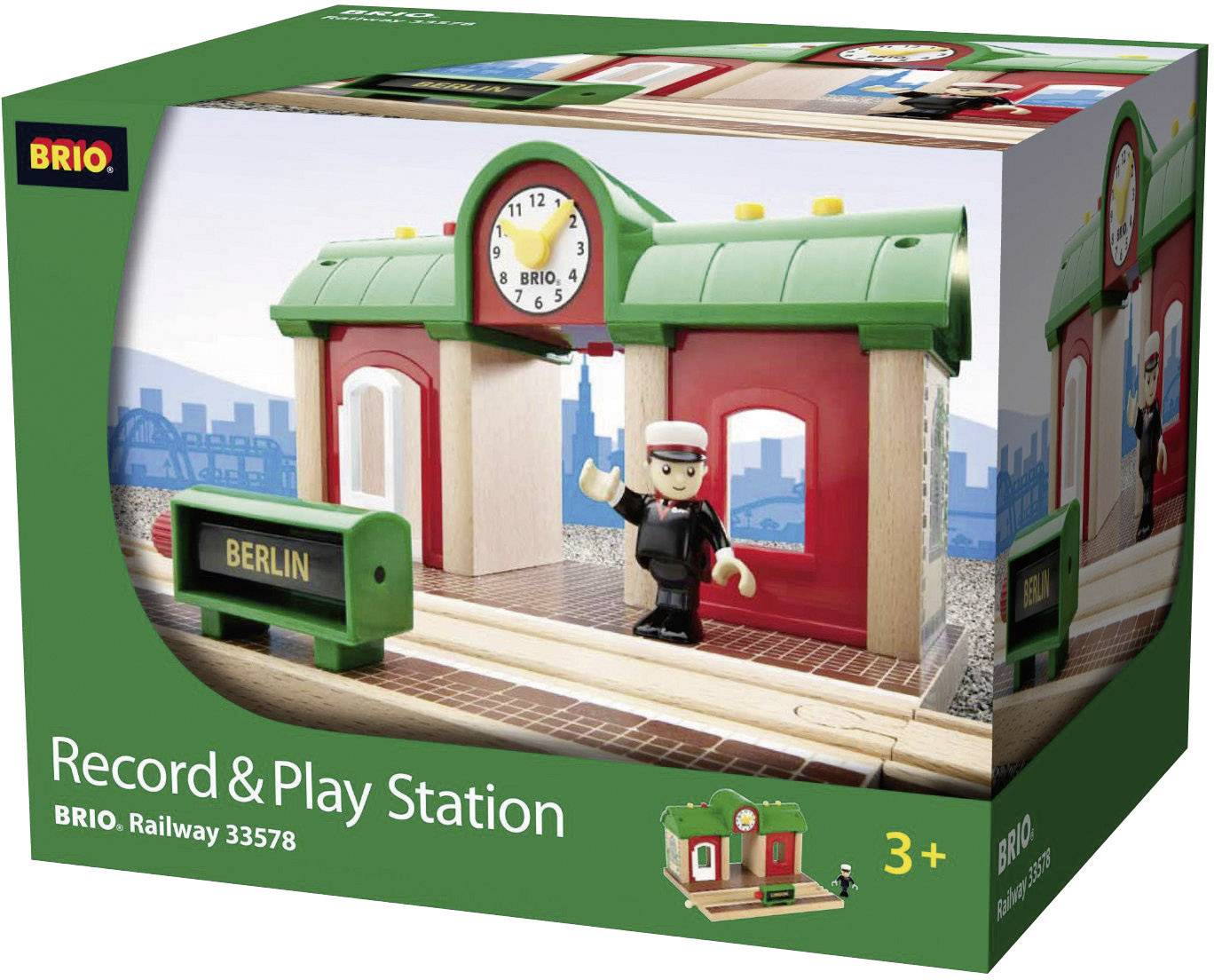 Confezione giocattolo per stazione ferroviaria Brio, adatta a bambini dai 3 anni. Include una figura, un orologio e un cartello con la scritta 'Berlino'.
