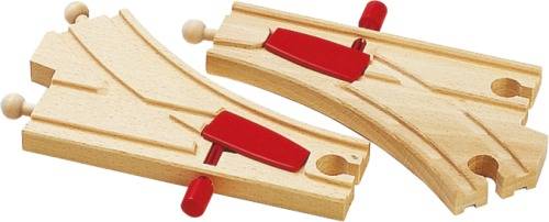 Due binari di legno con interruttori basculanti rossi che possono essere utilizzati per controllare gli scambi e modificare il percorso dei binari di un trenino giocattolo.