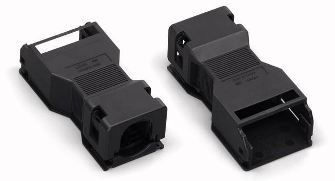 Due involucri di plastica nera utilizzati per connessioni di cavi Ethernet. Uno è mostrato dall'alto, l'altro dal lato.