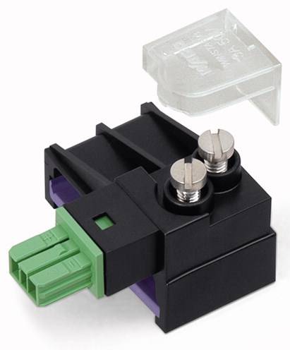 Un connettore elettrico nero con due viti argentate e un collegamento verde, coperto da un cappuccio trasparente.