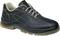 Una scarpa nera in pelle con suola chiara e cuciture decorative, ideale per occasioni formali o per l'ufficio.