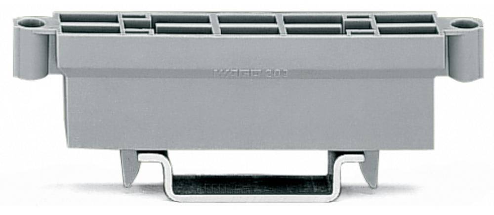 Componente meccanico grigio con struttura rettangolare e supporto inferiore, probabilmente un elemento di sicurezza o un componente di un dispositivo tecnico.