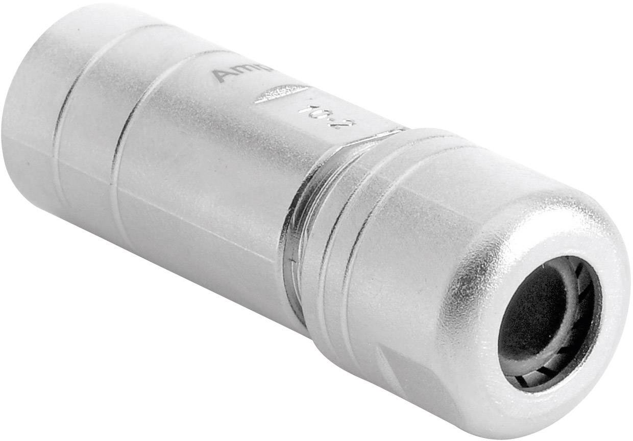 Un connettore metallico argentato, presumibilmente per audio o video, giace diagonalmente al centro dell'immagine.