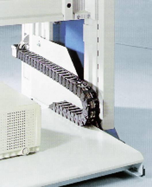 Catena portacavi industriale su una macchina, che guida e protegge i cavi in modo sicuro. È fissata a un telaio bianco.