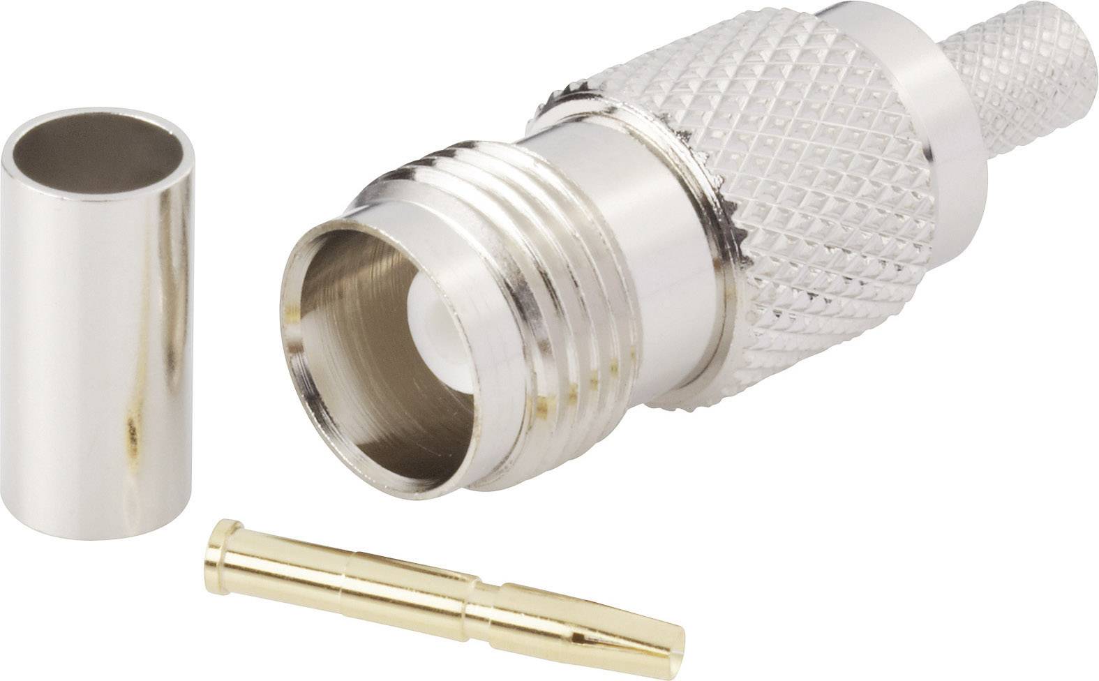 Componenti di connessione: un connettore metallico zigrinato, un pin di contatto dorato e un rivestimento protettivo cilindrico in metallo.
