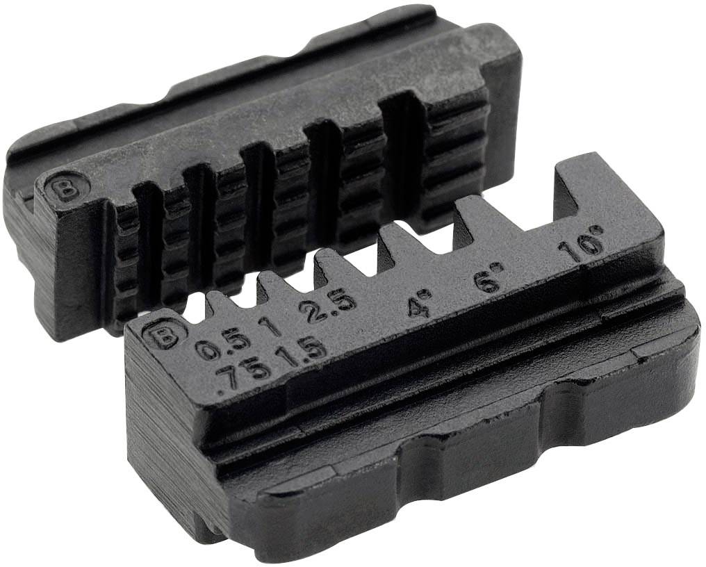 Due parti rettangolari nere in plastica con scanalature e tacche numerate, probabilmente utilizzate come distanziali o strumenti di misurazione.
