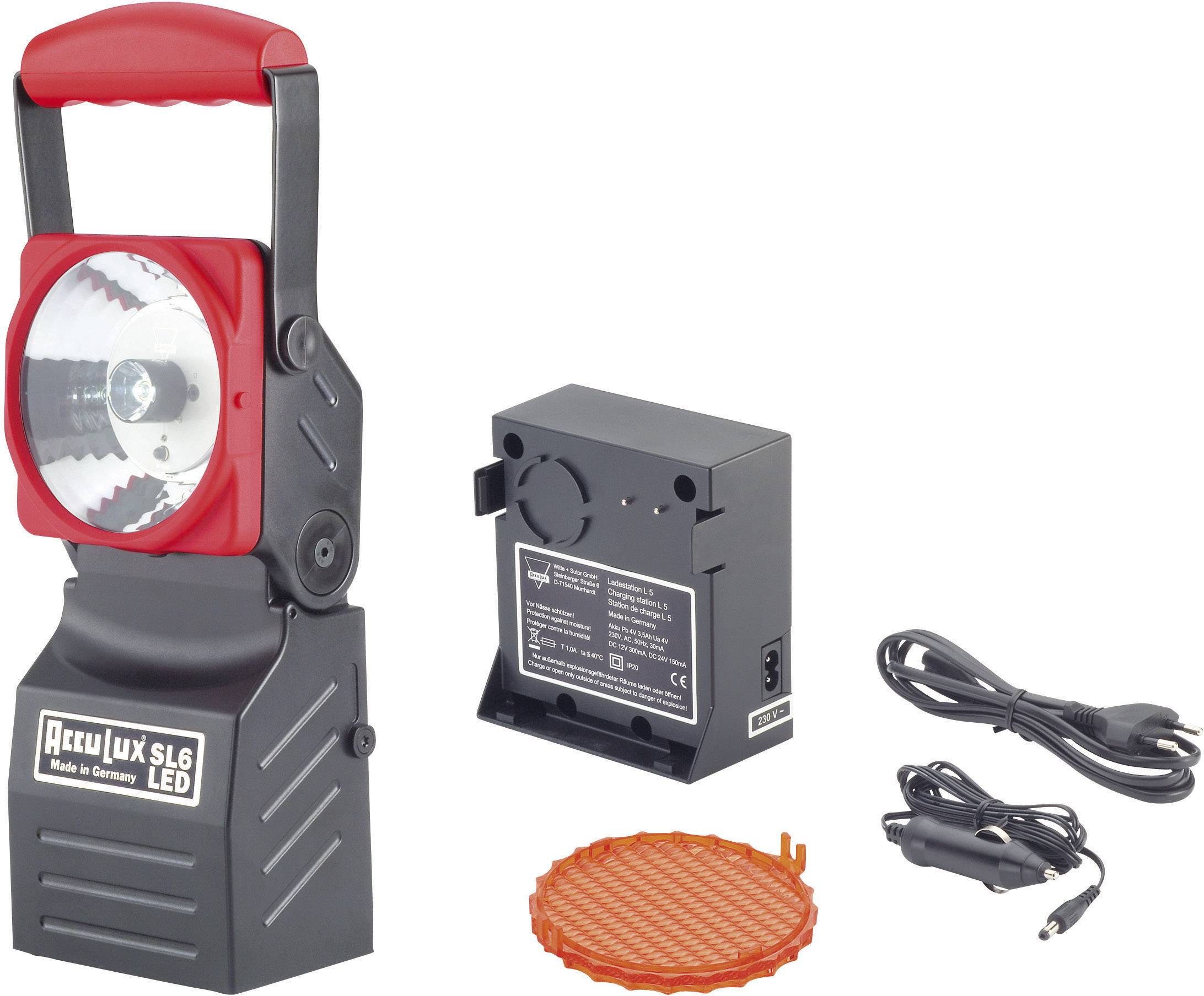 Lampada LED alimentata a batteria con impugnatura, caricatore, diffusore arancione e cavo. Caratteristica principale: illuminazione portatile.
