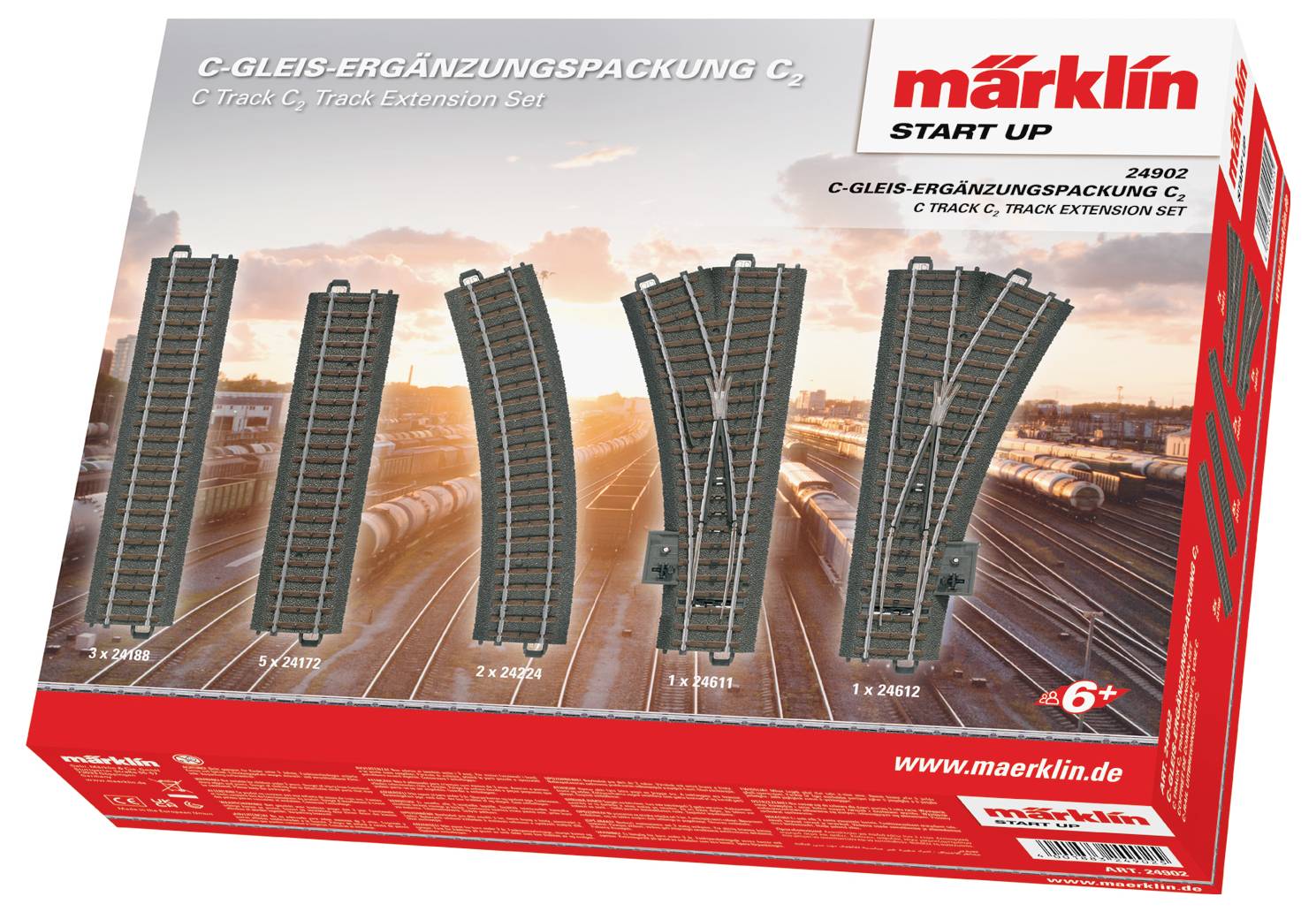 Verpakking van de Märklin C-Rails uitbreidingsset. Toont verschillende railstukken met opdruk '6+' en webadres 'www.maerklin.de'.
