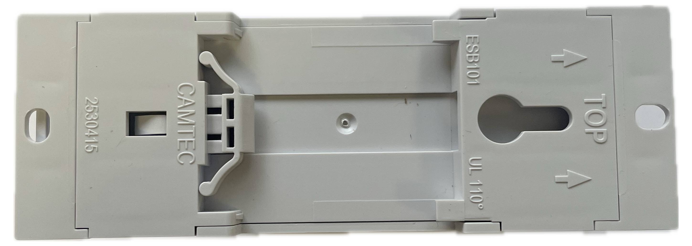 Een grijze rechthoekige kunststof behuizing met het opschrift 'CAMTEC', 'ESB101', 'UL 110°' en 'TOP'. Rechthoekige opening in het midden.