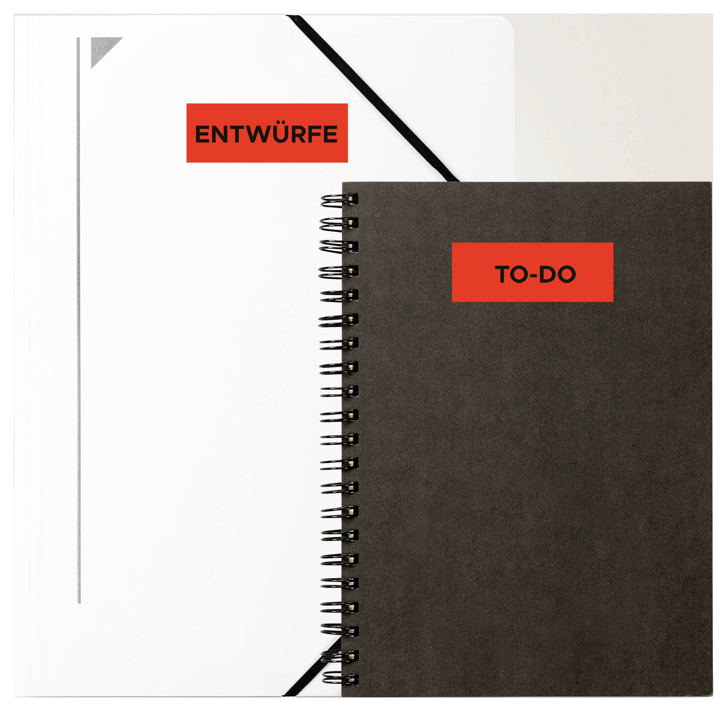 Twee notitieboekjes naast elkaar, links wit met 'CONCEPTEN', rechts zwart met 'TO-DO', als tegenoverstellung van concepten en taken.